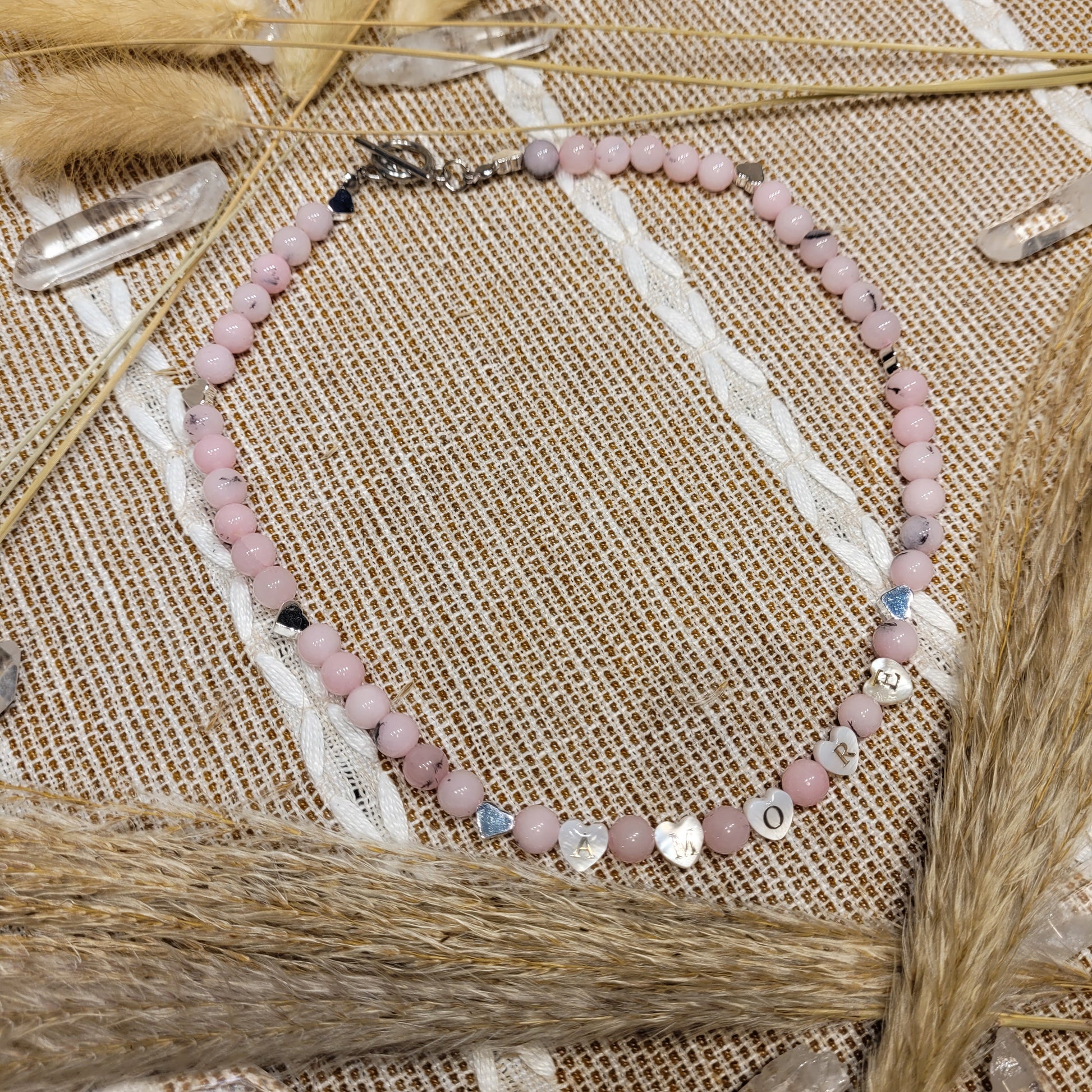 Pink opal stainless steel heart necklace with mother of pearl heart beads